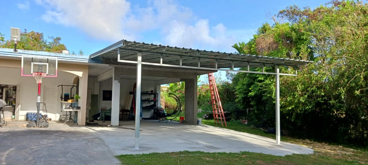 Metal carport and driveway